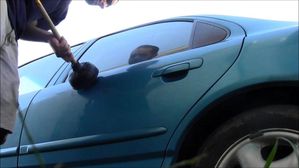 how to fix a large dent in a car door