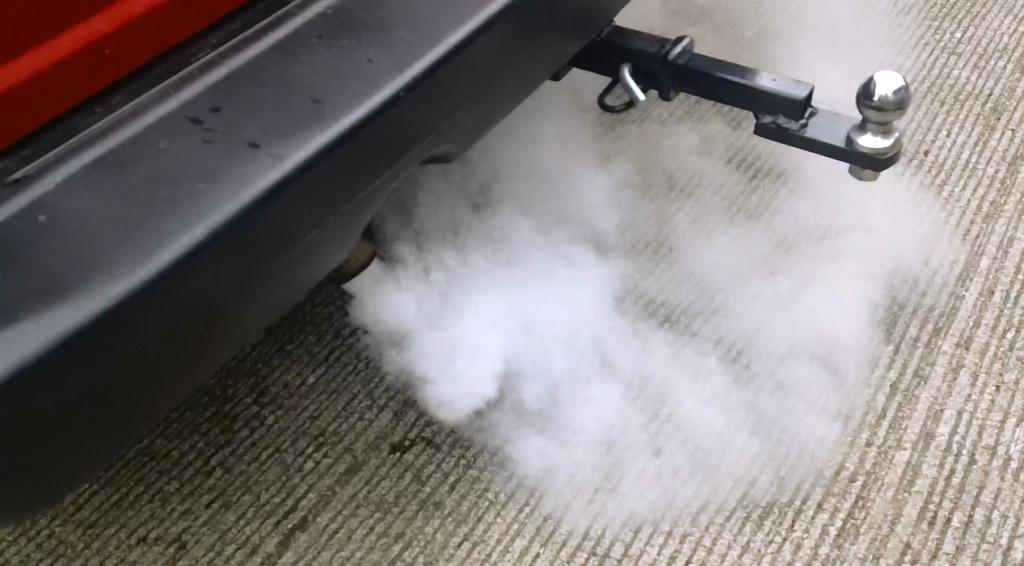 what causes white smoke from exhaust pipe