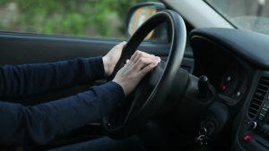 Positioning hands when driving car