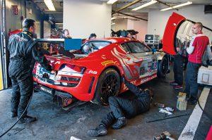 mechanics checking car