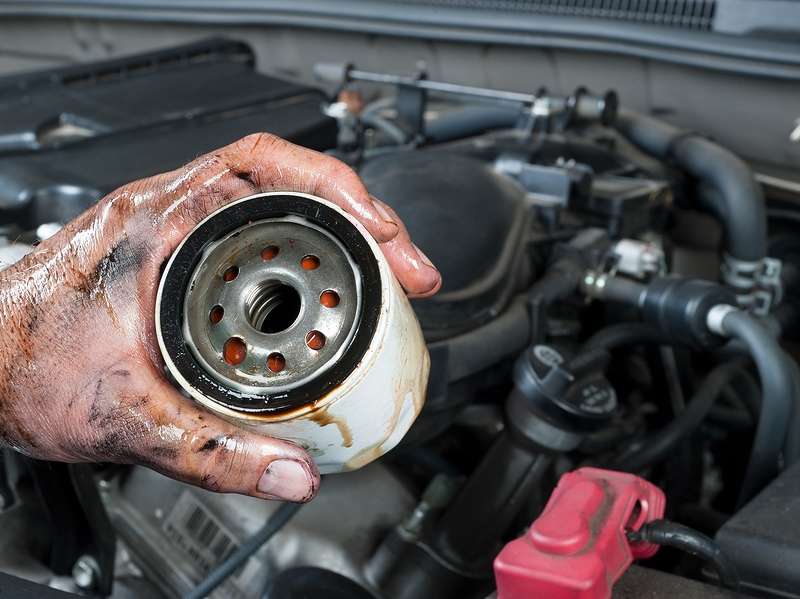 Lubricate the filter seal. car oil change