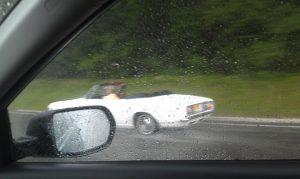 car rushing in the rain