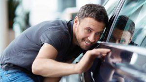 inspecting car