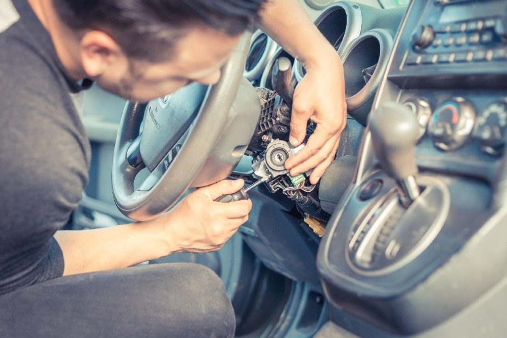 how to unlock steering wheel without a key