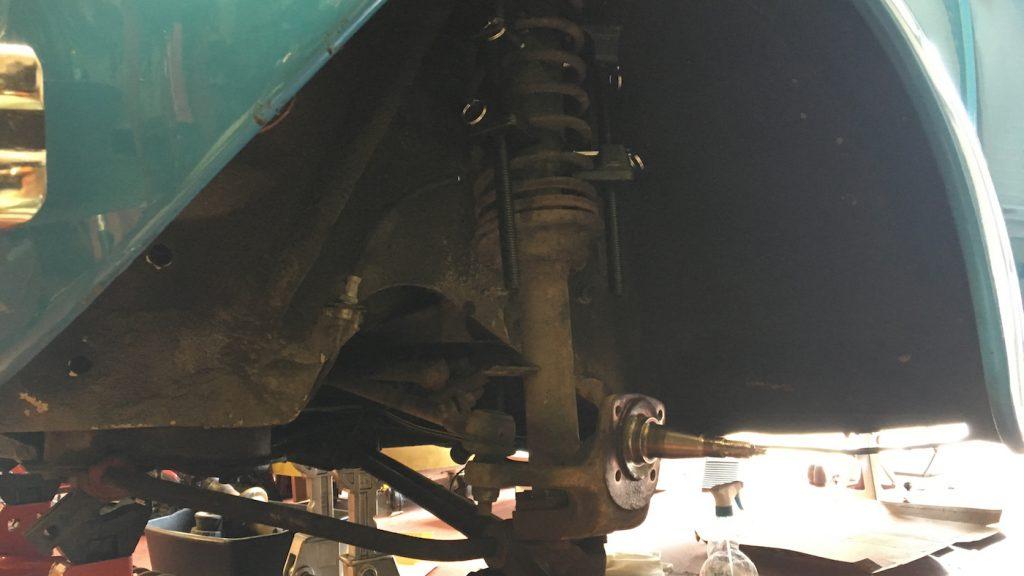 Overall removal of lower control arm bolt