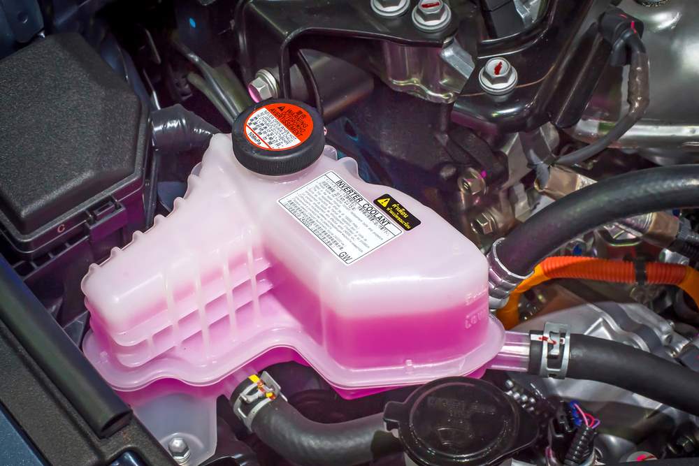 pink fluid from car