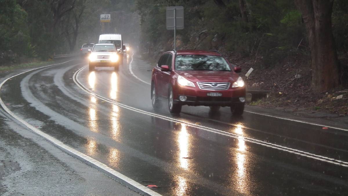 car headlights in the rain