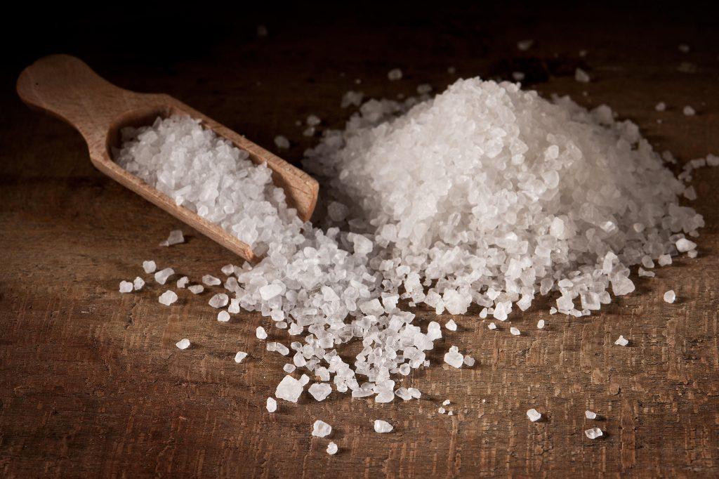 Using salt to melt ice on car