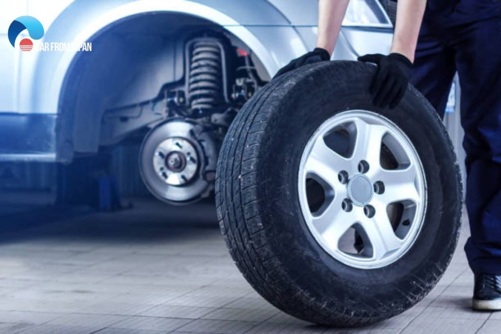 where do you put new tires front or back