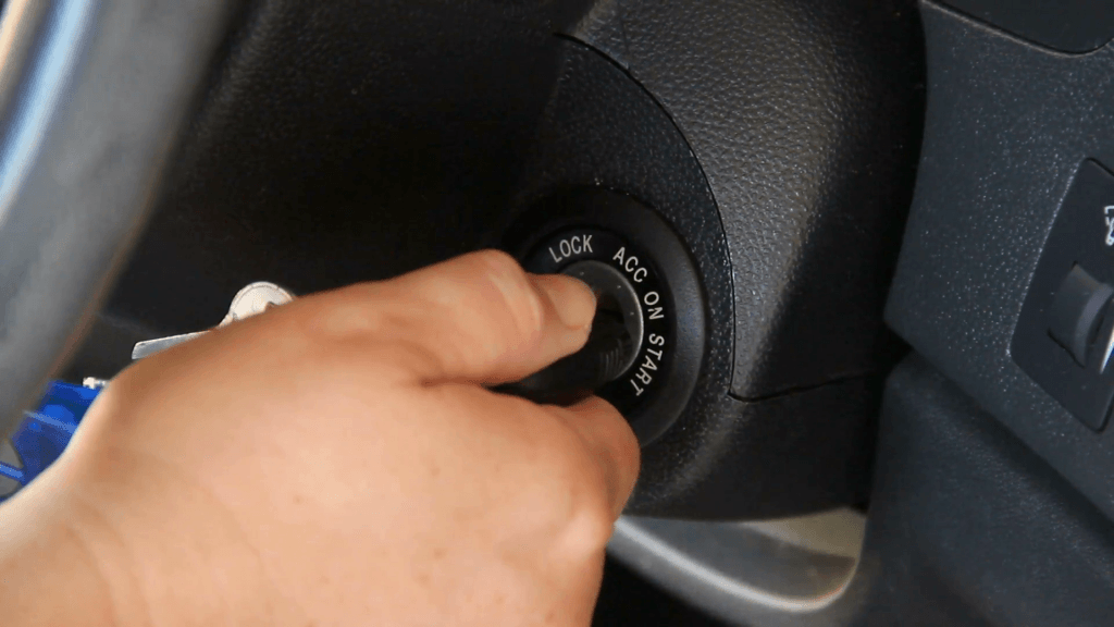 What happens to the vehicle when you turn on the ignition switch? 