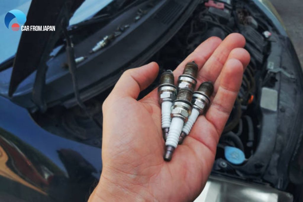 spark plug worn out symptoms
