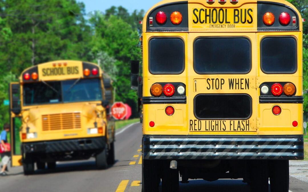 school bus red lights flash warning
