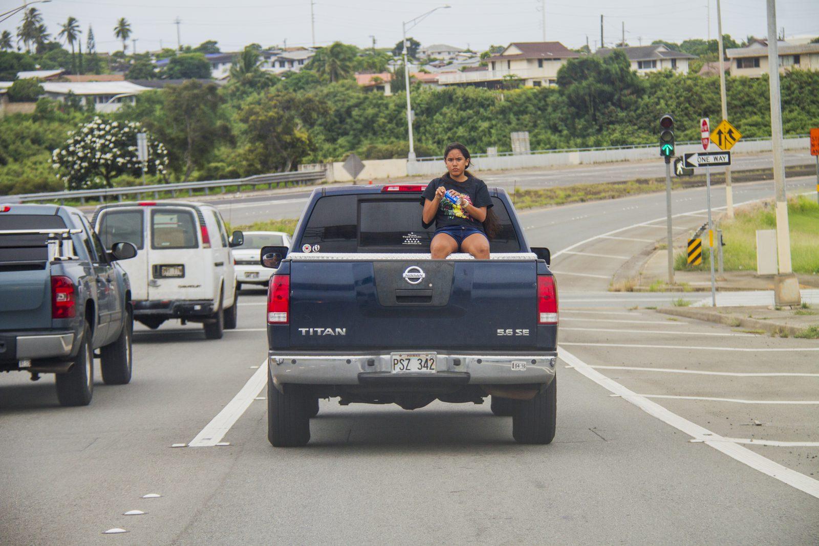 ride in the back of a truck