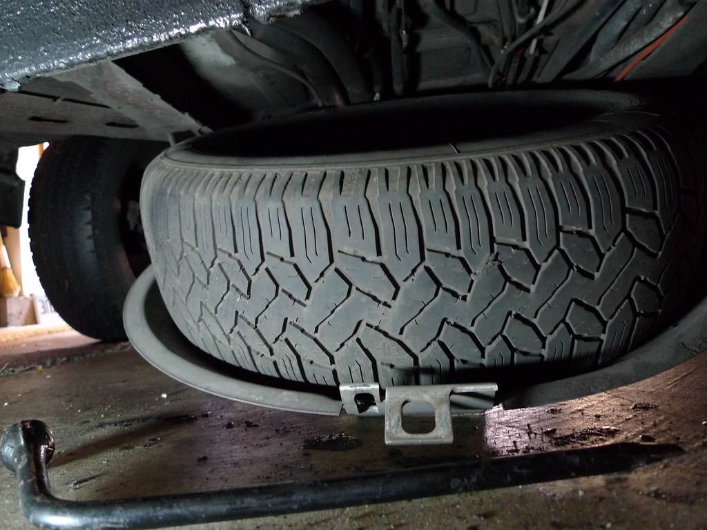 how to get a spare tire down without the tool