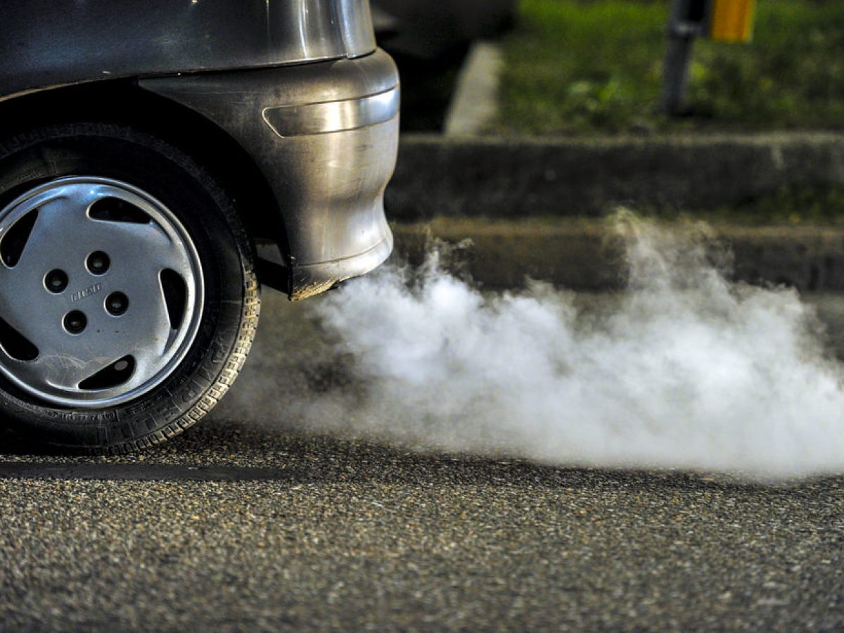 Water bottle getting stuck in the car accelerator and brake peddle  demonstrating the danger of the inability to apply the brake or  acceleration Stock Photo