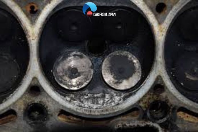 sticking valves from carbon deposits
