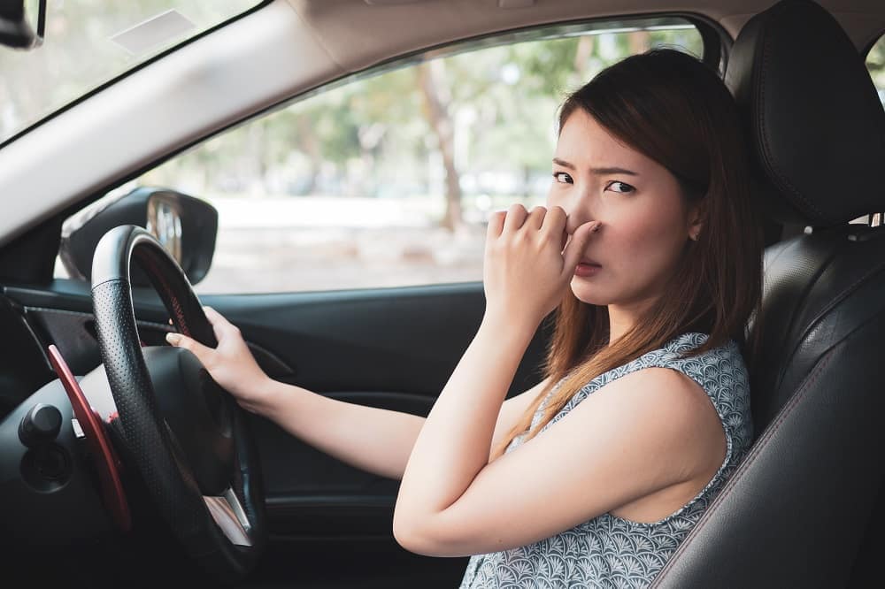 Why Your Car Has Smelly Exhaust Fumes & How To Fix