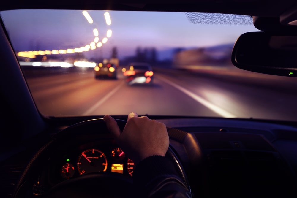 driving at night with motorcycles