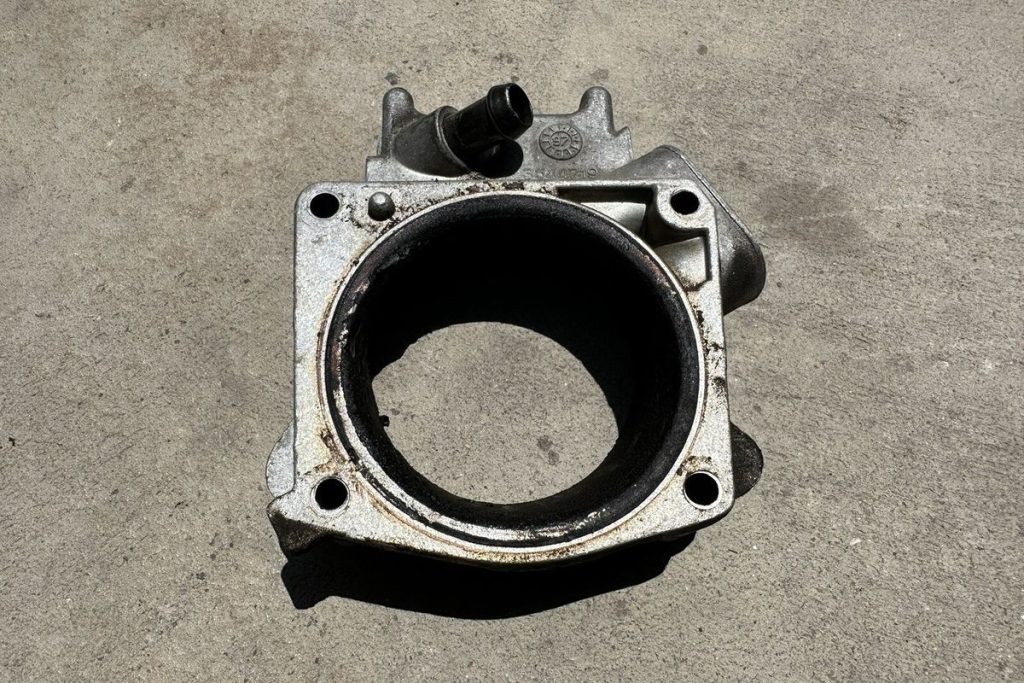 throttle body spacer what does it do