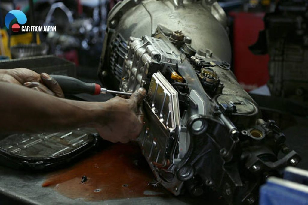 do you add transmission fluid while the car is running