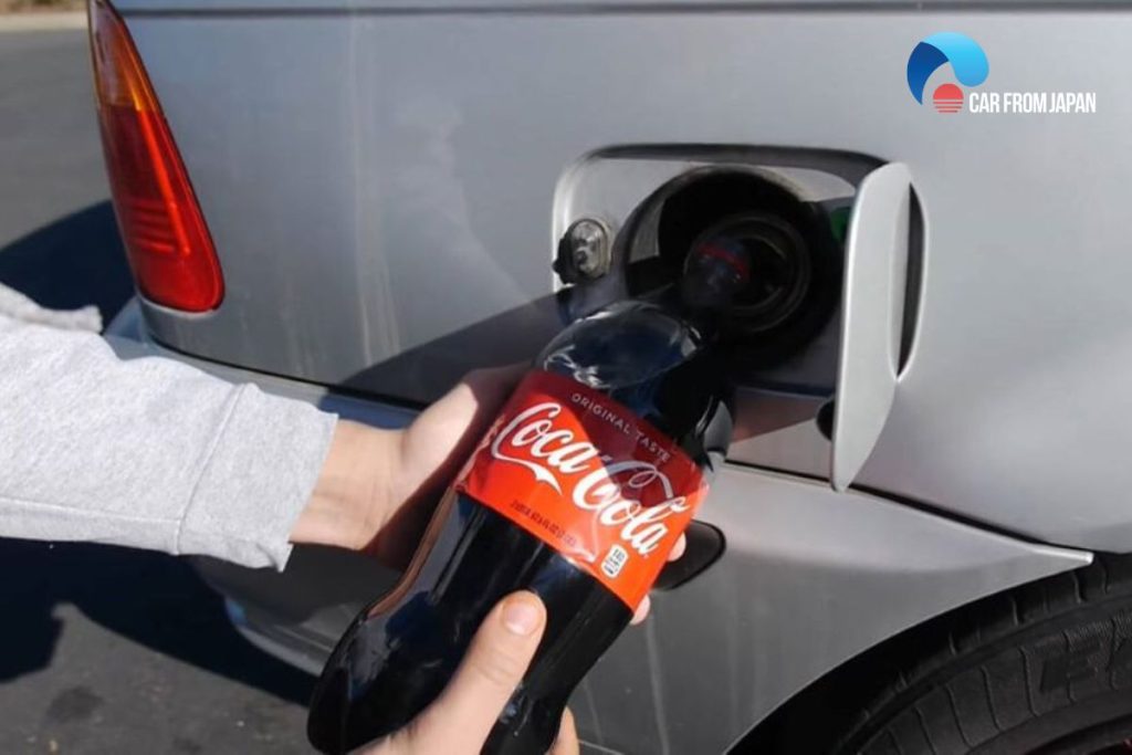 coca cola in gas tank