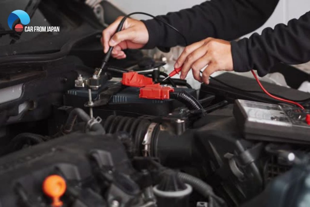 how to charge a car battery without jumper cables