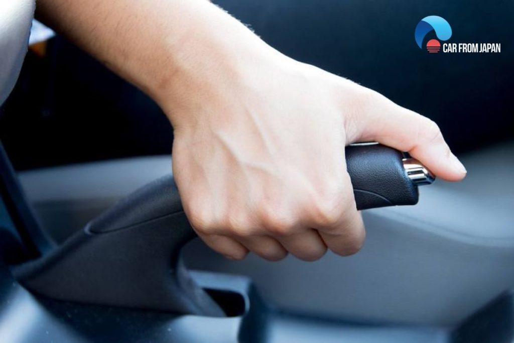 how does handbrake work on rear disc brakes