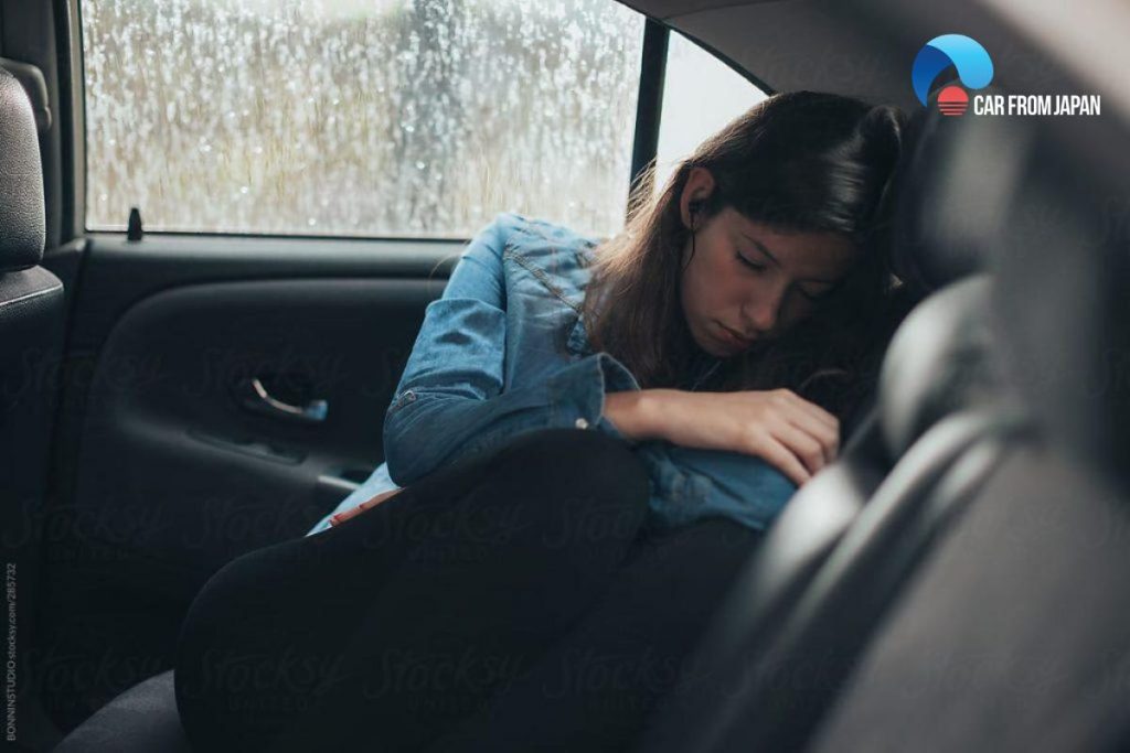 sleeping in a car