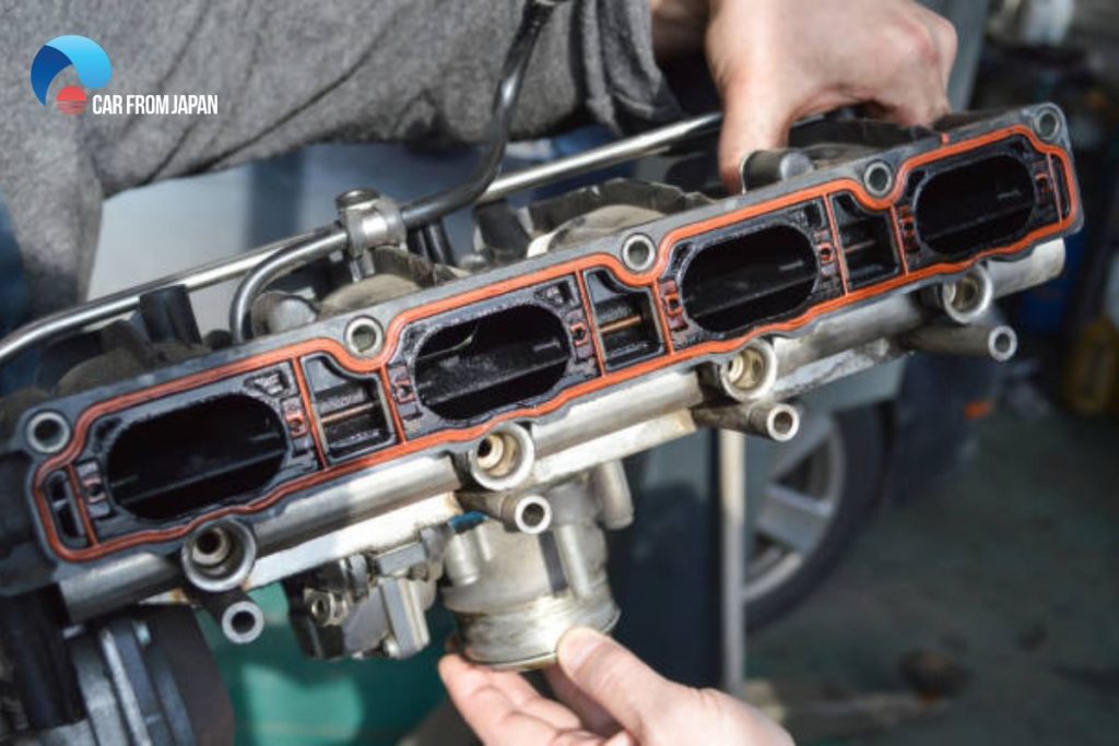 what does an intake manifold do