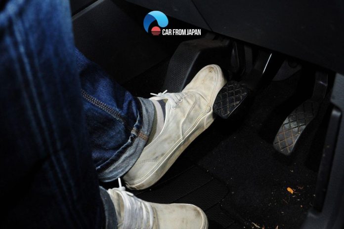 pressing the clutch pedal while starting the car in neutral