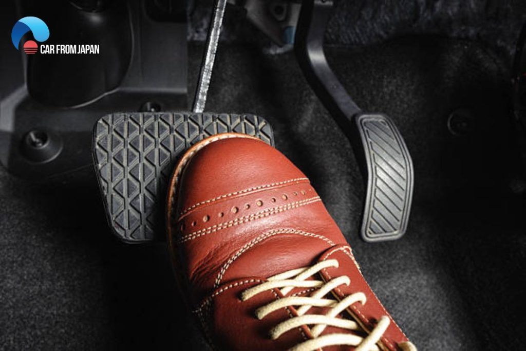 how to brake safely while traveling downhill